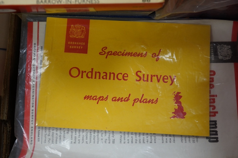 A collection of Ordnance Survey maps, including some early examples laid on canvas, a few ordinance survey related books and guides, an engraved Roman map of Britain dated 1821, and a few other maps. Condition - fair to